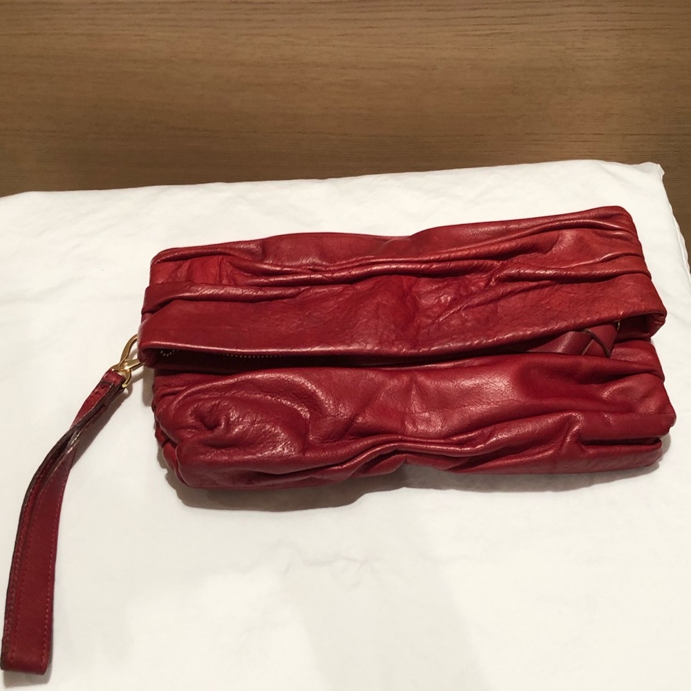 Red leather clutch
